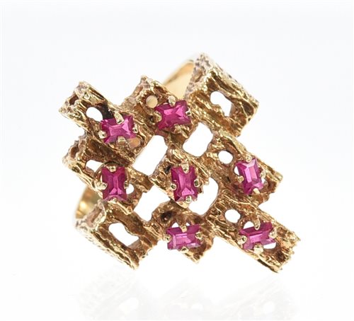 Lot 482 - 1970s gold dress ring of abstract design,
