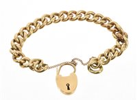 Lot 484 - Yellow metal curb link bracelet with padlock...