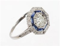 Lot 495 - Art Deco-style diamond and sapphire cluster...