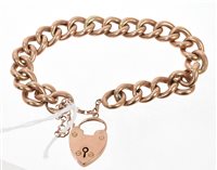 Lot 519 - Rose-coloured metal hollow curb link bracelet...