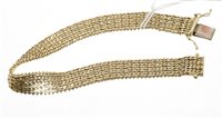 Lot 540 - 14ct gold bracelet with articulated chevron links