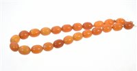 Lot 545 - Old amber necklace with a string of...