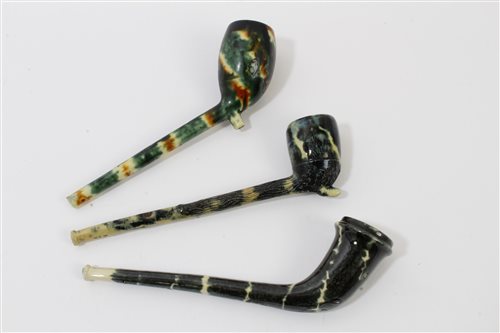 Lot 141 - Three 18th century Whieldon-type pipes with...