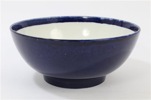 Lot 17 - 18th century powder-blue punch bowl raised on...