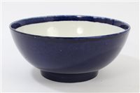 Lot 17 - 18th century powder-blue punch bowl raised on...