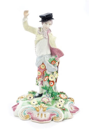 Lot 75 - 18th century Chelsea figure of a young man...