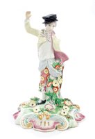 Lot 75 - 18th century Chelsea figure of a young man...