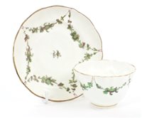 Lot 92 - Bristol-style tea bowl and saucer with green...
