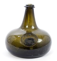 Lot 110 - Fine early 18th century green glass seal...