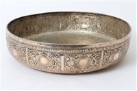 Lot 381 - Large Far Eastern white metal bowl of circular...