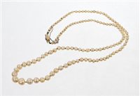 Lot 401 - Cultured pearl necklace with a string of...