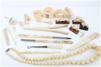 Lot 674 - Group of antique ivory and carved bone items -...