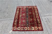 Lot 1460 - Sozani rug with multiple rows of floral motifs,...