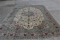 Lot 1457 - Large Kashan carpet with central petalled...