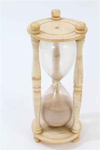 Lot 740 - 19th century carved ivory hourglass of typical...