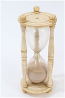 Lot 740 - 19th century carved ivory hourglass of typical...