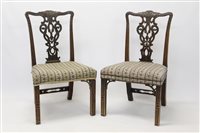 Lot 1417 - Elaborate pair of Chippendale-style side...