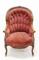 Lot 1428 - Victorian walnut tub chair with button...