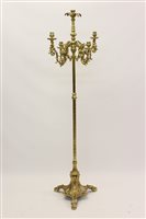 Lot 1352 - Baroque-style brass floor-standing candelabrum...