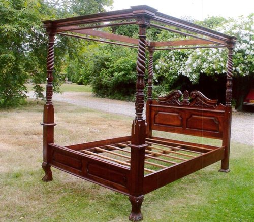 Lot 1367 - Victorian-style carved hardwood four-poster...