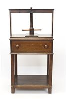 Lot 1372 - George III oak press chest, surmounting press...