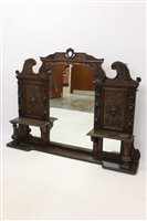 Lot 1383 - Victorian carved oak overmantel, the central...