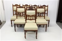 Lot 1395 - Matched set of eight late Victorian walnut...