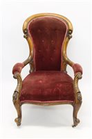 Lot 1342 - Victorian walnut spoon back open armchair with...