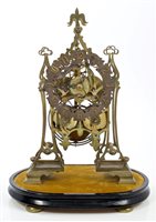 Lot 1255 - 19th century brass skeleton clock with pierced...