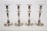 Lot 221 - Set of four 19th century EPNS candlesticks...