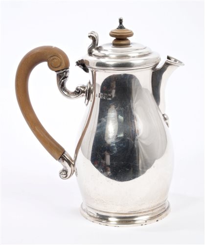 Lot 227 - Edwardian silver hot water jug of baluster