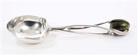 Lot 239 - Late Victorian Liberty silver sugar spoon,...