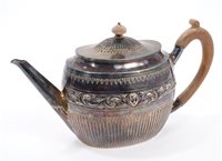 Lot 243 - Victorian silver teapot of oval form, with...