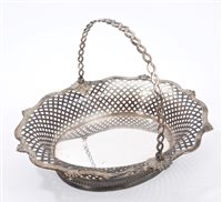 Lot 244 - Fine quality George II silver cake basket of...