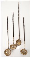 Lot 289 - Four Georgian silver toddy ladles with silver...