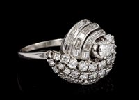 Lot 463 - 1960s diamond cocktail ring, the stylised...