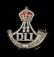 Lot 467 - White gold, diamond and enamel military...