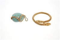 Lot 468 - Eastern yellow metal snake bangle and a 1960s...