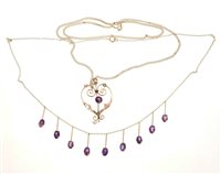 Lot 513 - Edwardian amethyst fringe necklace with nine...