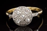 Lot 516 - Art Deco diamond cluster ring, the circular...