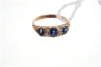 Lot 552 - Edwardian sapphire and diamond ring with three...