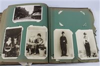 Lot 2417 - Postcards in album - including military, silks,...