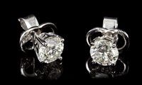 Lot 568 - Pair diamond single stone stud earrings, each...