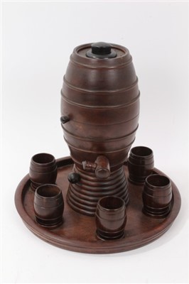 Lot 644 - Late 19th Century treen brandy barrel and cup set on circular tray