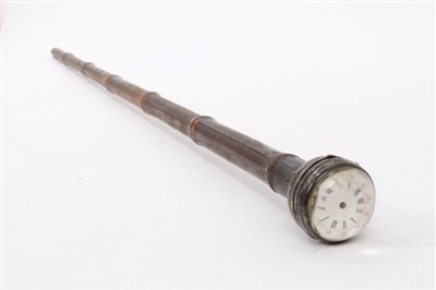 Lot 800 - 19th century novelty bamboo walking cane with watch inset to glazed globular handle