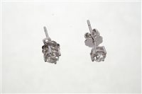 Lot 604 - Pair diamond single stone stud earrings, each...