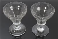 Lot 121 - Pair George III glass rummers with knopped...