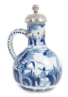 Lot 133 - 17th century Japanese Arita blue and white jug...