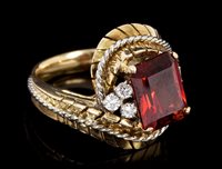 Lot 475 - Mid-20th century garnet and diamond dress ring,...