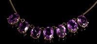 Lot 478 - Amethyst necklace with seven oval mixed...